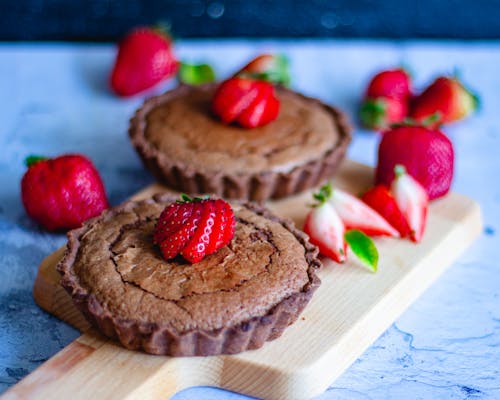 Free Chocolate Tart on Wooden Chopping Board Stock Photo