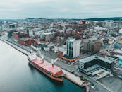 Harbor of modern city with cargo ship