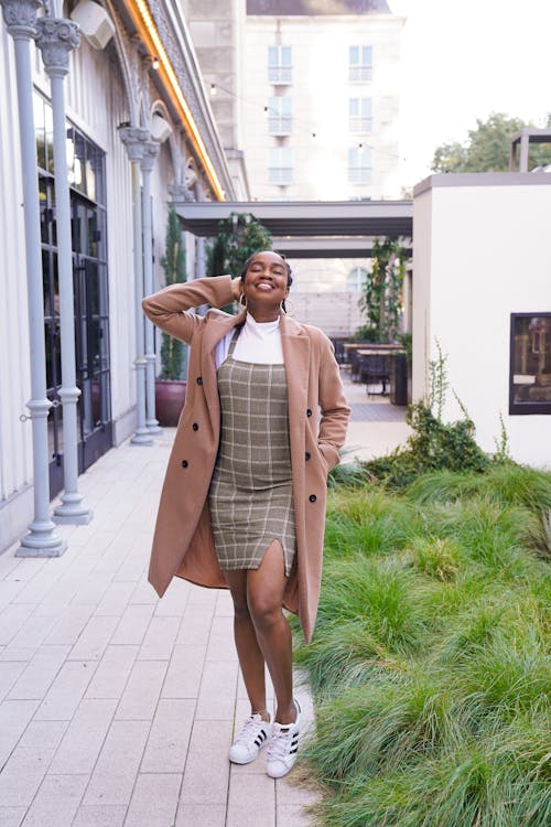 A Woman Wearing a Brown Coat