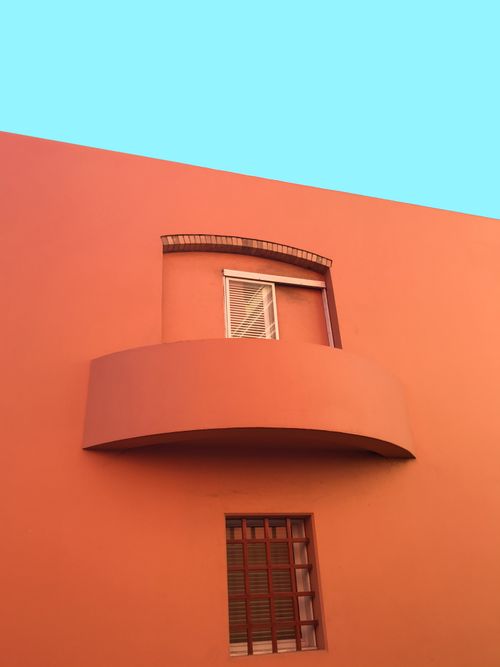 Free Minimalist facade with vibrant colors and clear sky in Cartagena, Colombia. Stock Photo