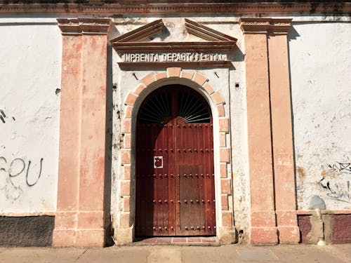 Brown Wooden Door Entrance of a Building