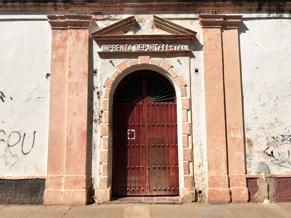 Brown Wooden Door Entrance of a Building