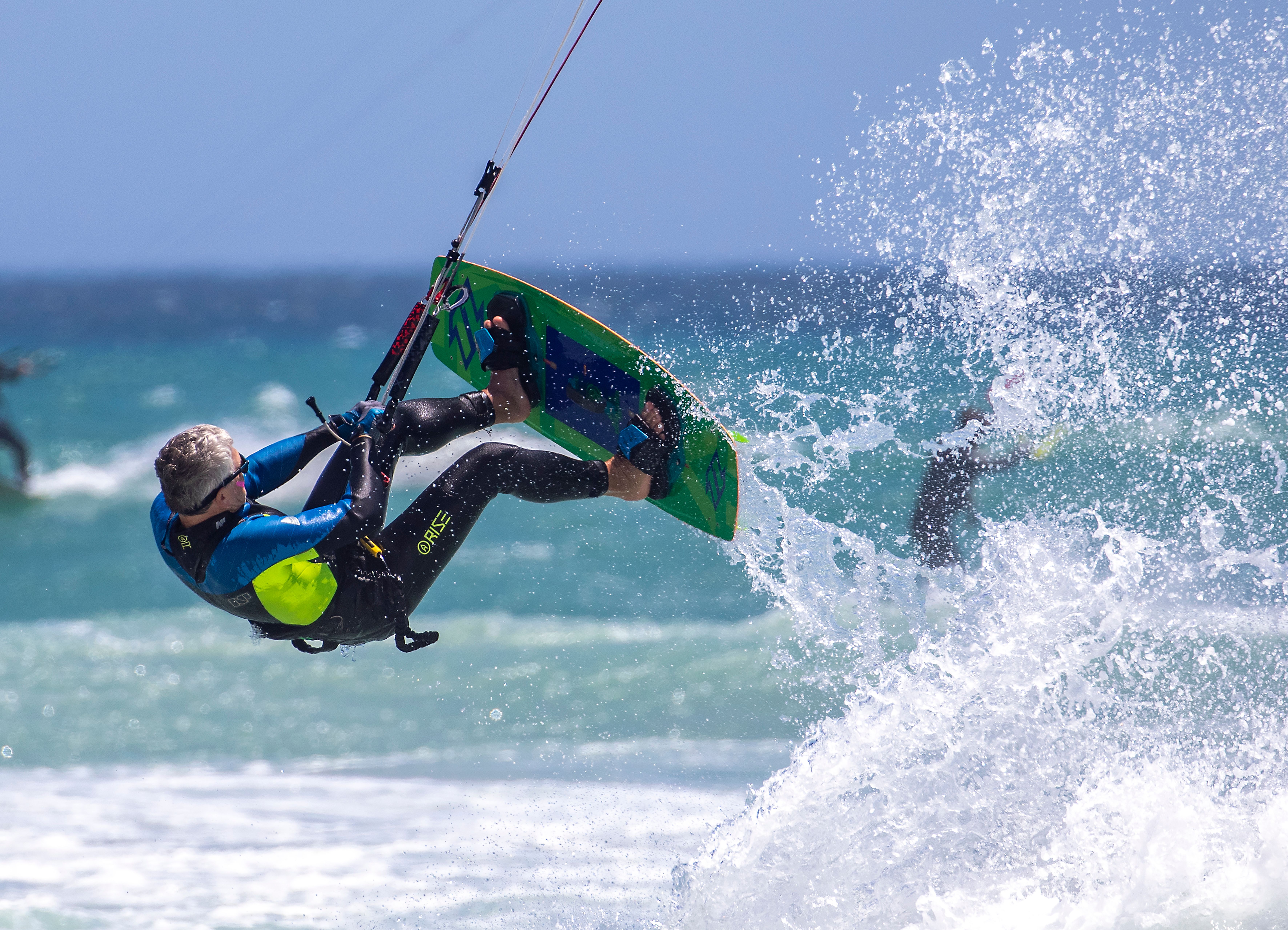 Surfer skillfully rides a powerful wave at Jeffreys Bay, South Africa
