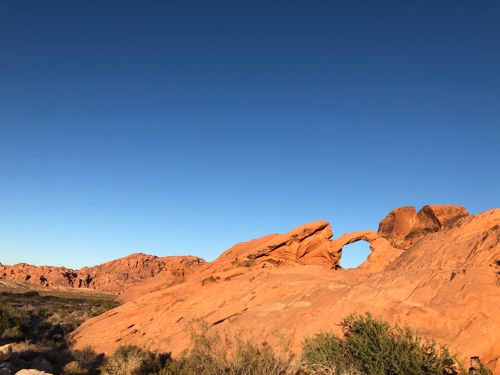 Free Explore the stunning red rock formations under a clear blue sky in Nevada's Valley of Fire State Park. Stock Photo