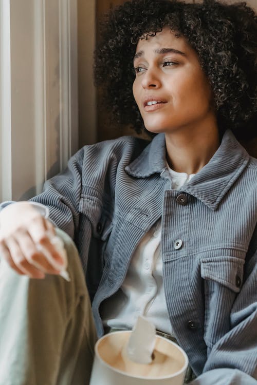 Free Suffering black woman crying in solitude Stock Photo