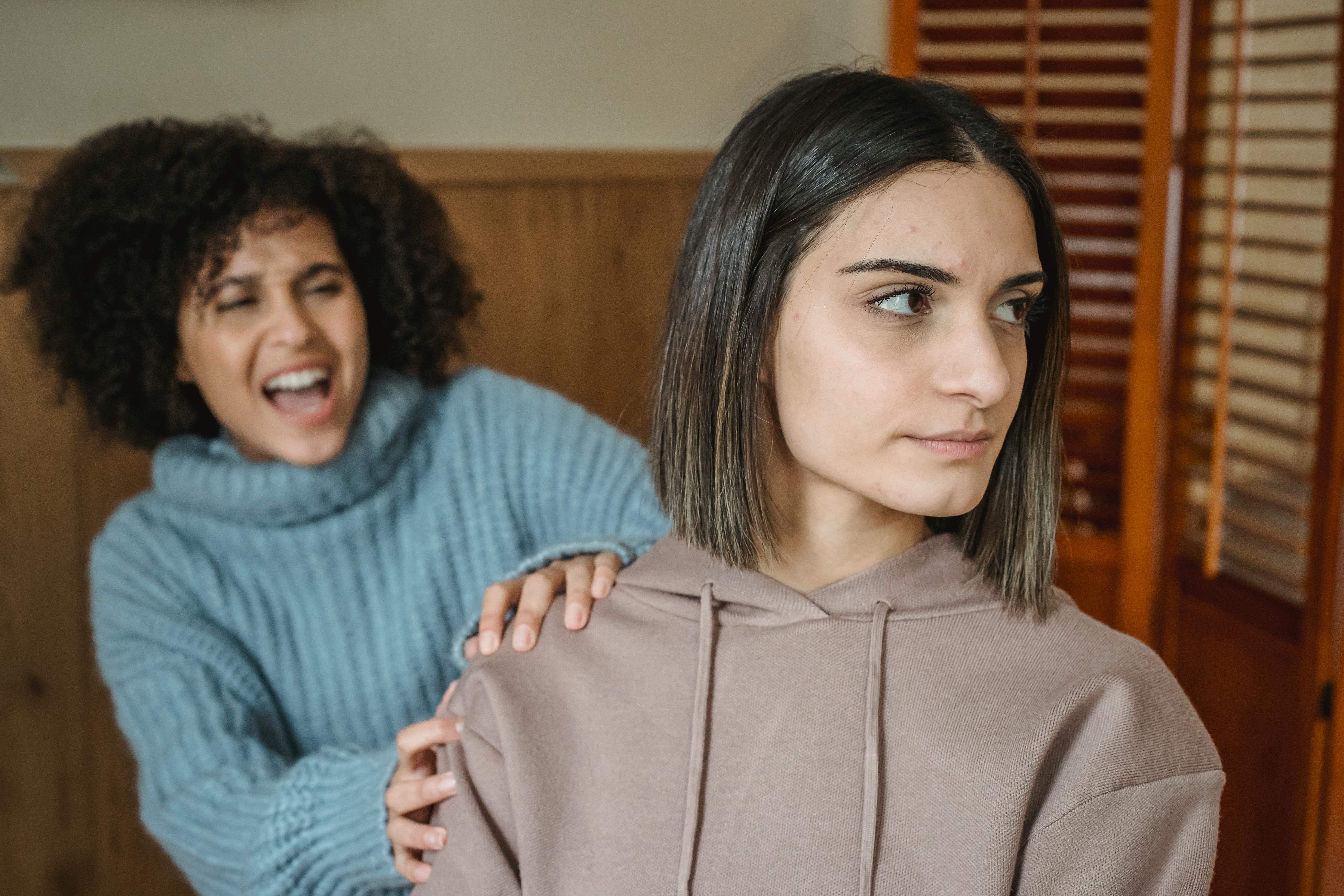 multiethnic irritated women having fight