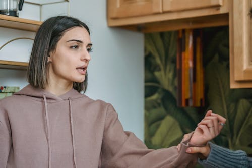 Free Displeased woman having conflict with crop female Stock Photo