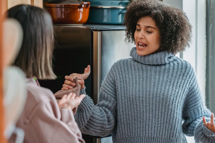 Angry Black Woman Having Conflict With Anonymous Female