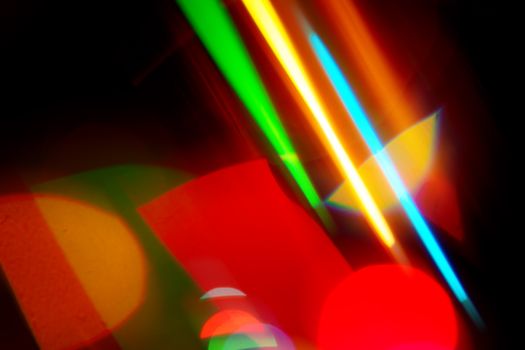 Dynamic and colorful abstract light trails creating a vivid and energetic composition.