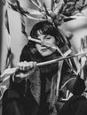 Grayscale Photo of Woman in Fur Coat