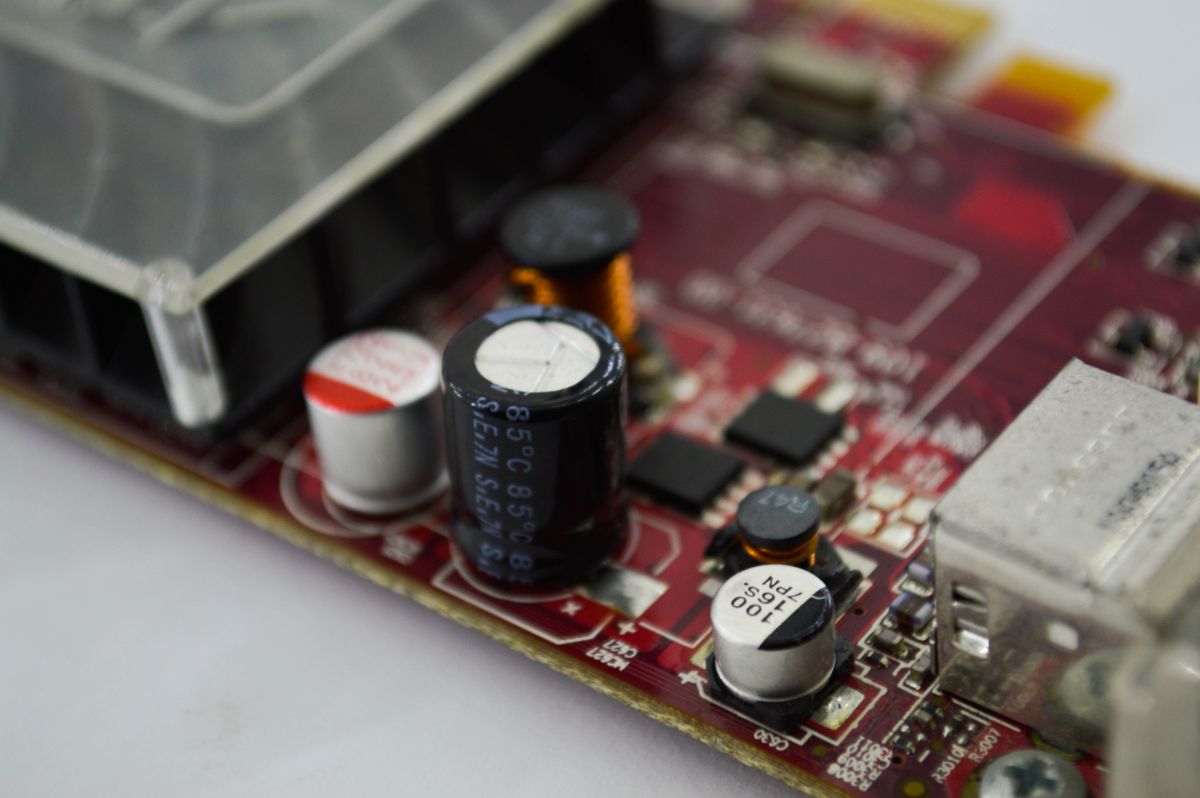 A motherboard's firmware chips govern boot, power delivery, fan curves, and CPU microcode