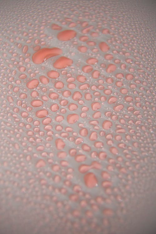 ピンクと白の水玉模様のテキスタイル
