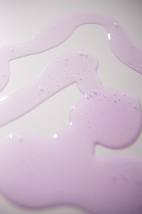 Free Abstract background of spilled gel with shiny surface Stock Photo