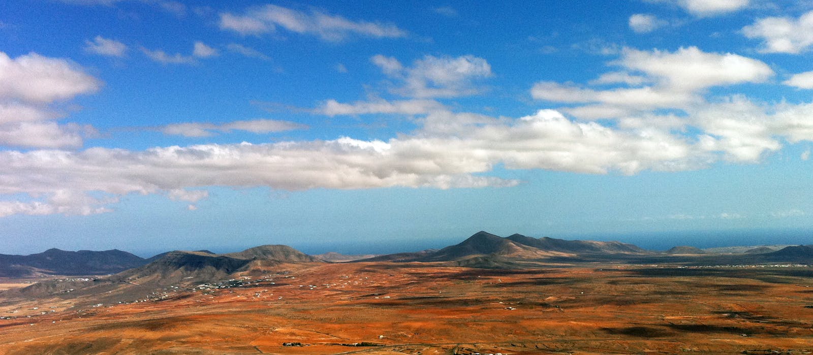 Person browsing a music playlist on a smartphone