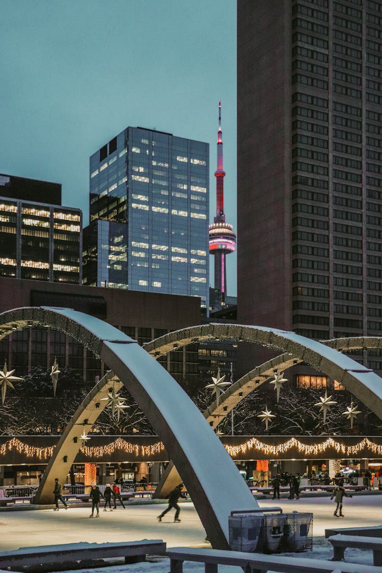 A Skating Rink With A Background Of CN Tower In Toronto, Canada