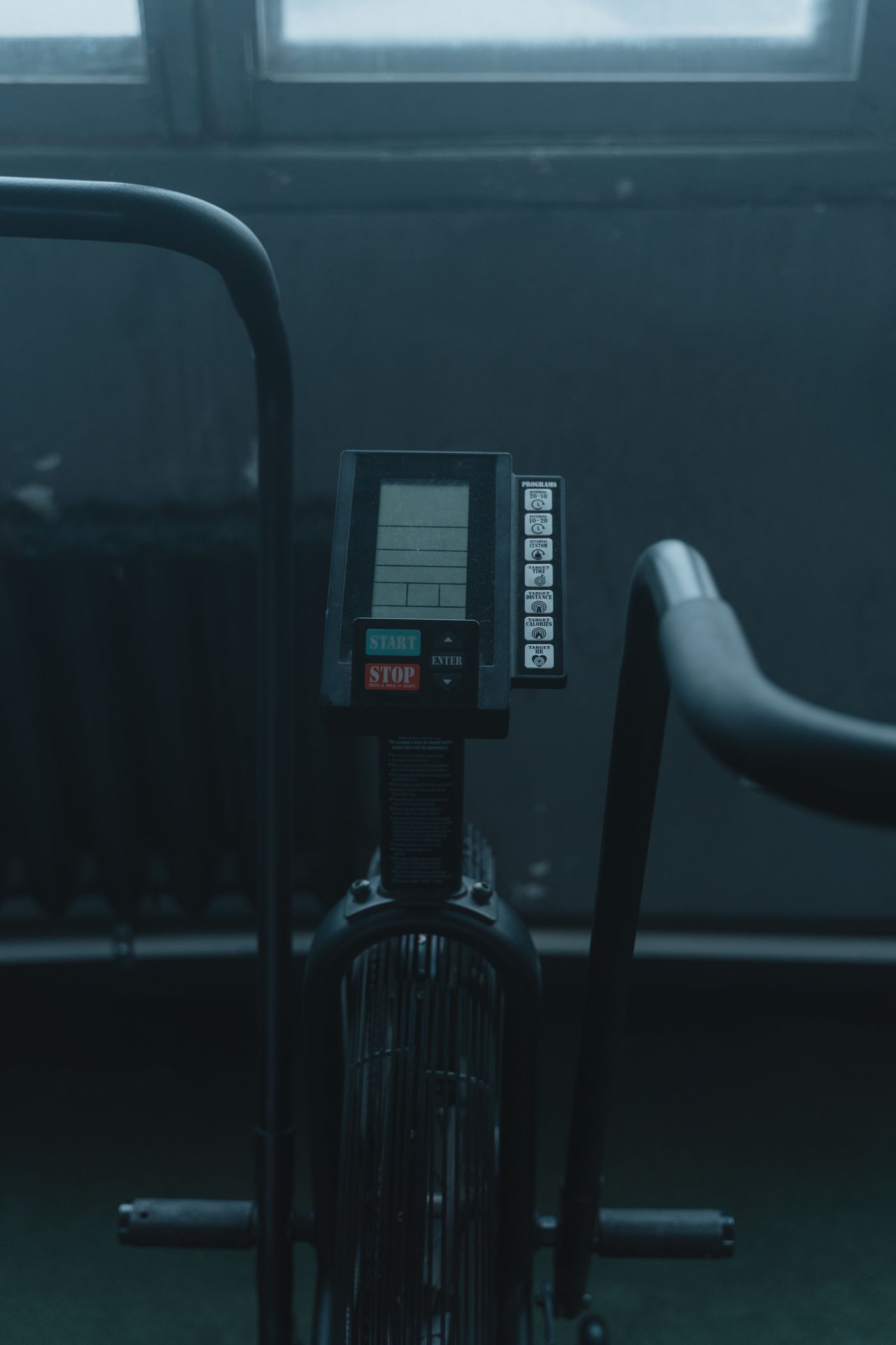 Electronic cardio equipment console in a home fitness space