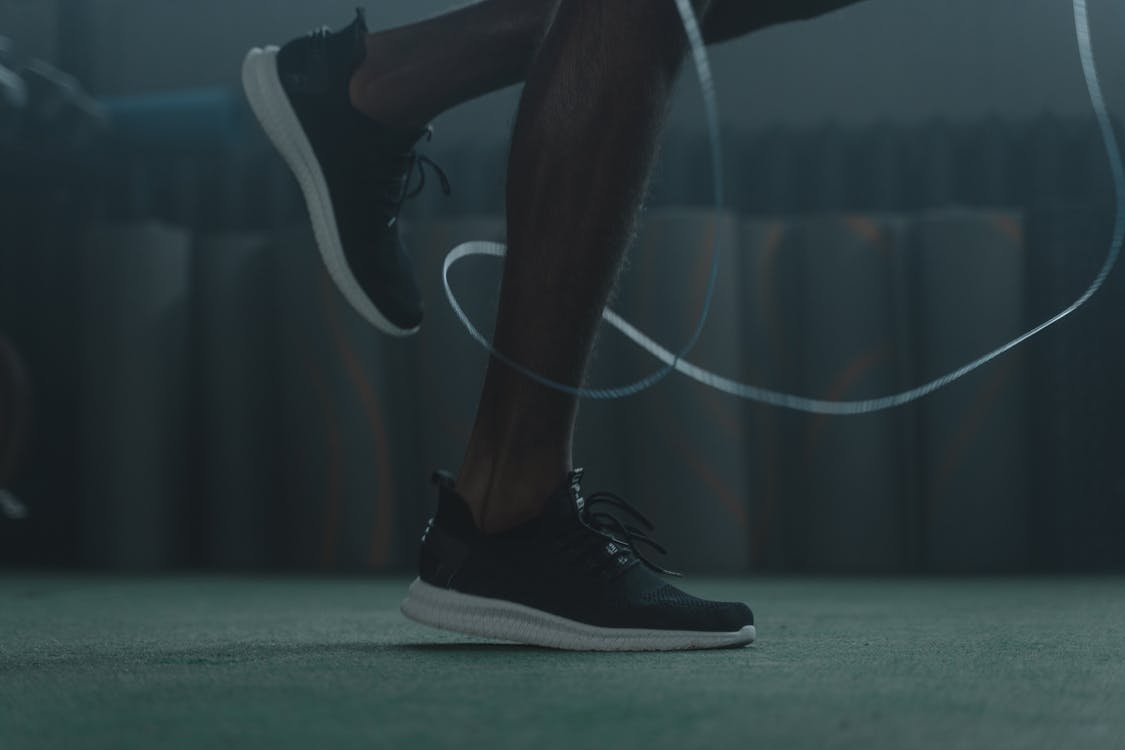 Free Close-Up Shot of a Person Wearing Sneakers Stock Photo