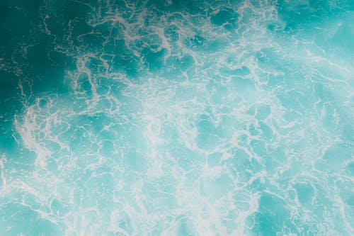 Aerial View of a Blue with White Seafoam