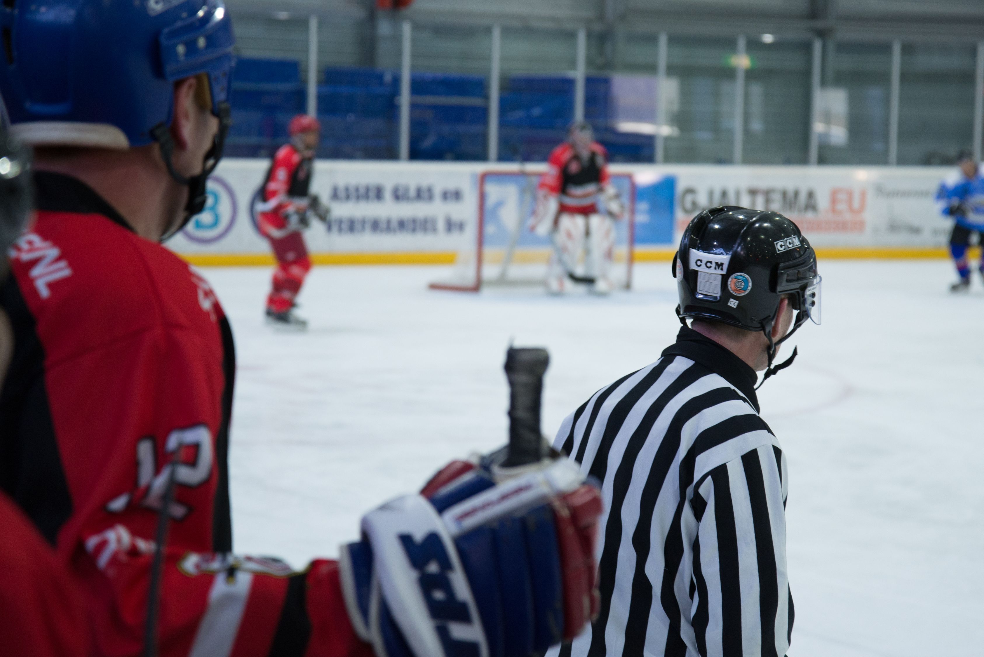 Hockey Players On Rink Free Stock Photo hockey-players-on-rink-free-stock-photo