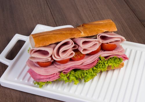 Stacked ham and salami sandwich — Miguel Marmolejos Fernández on Pexels