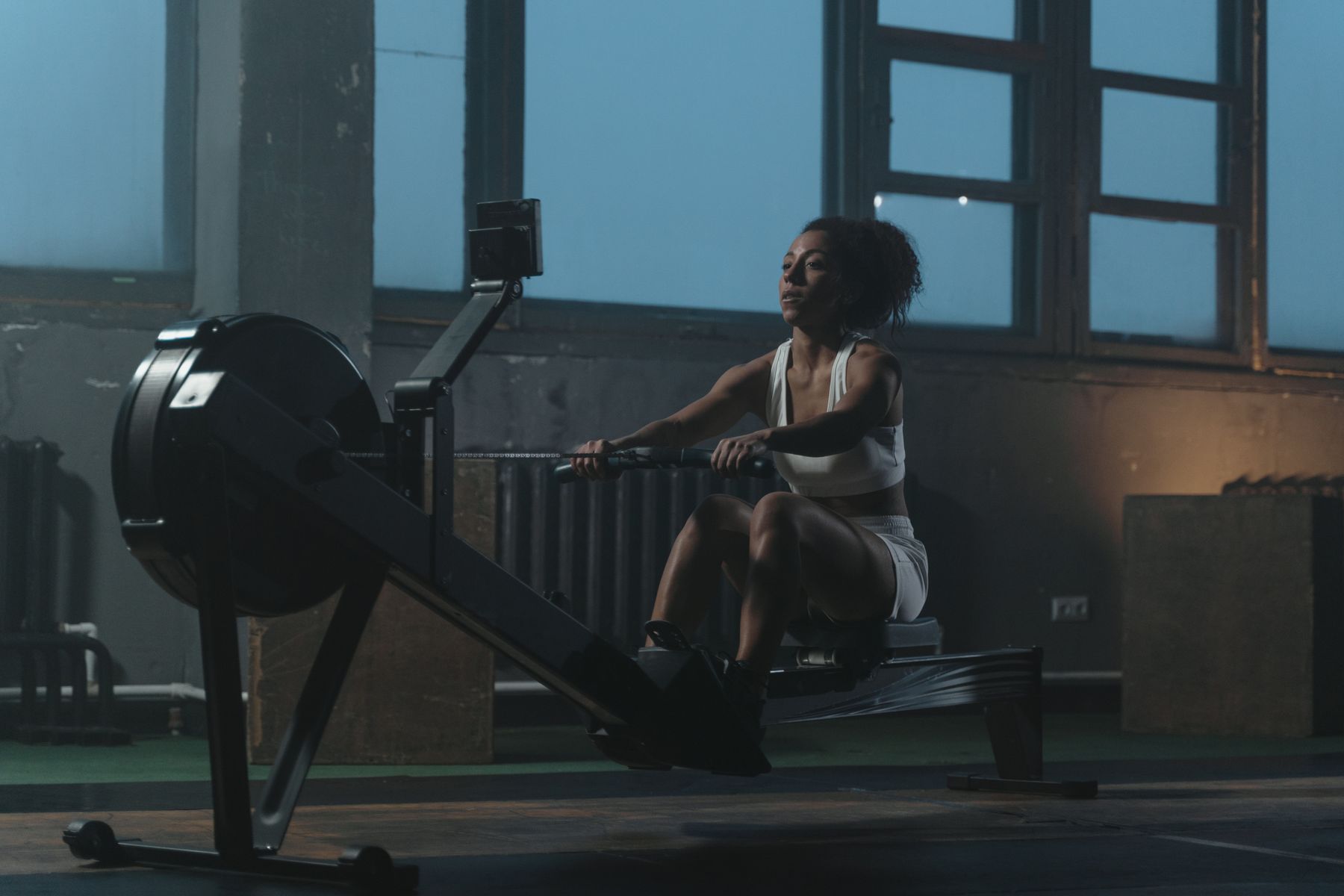 Athlete using gym equipment during a controlled training session