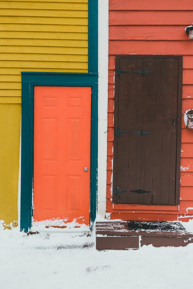 Bright House Facades With Doors In Winter Town