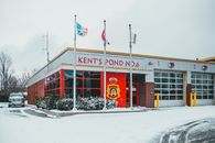 Building facade against flags in winter city