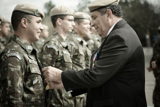 General Awarding Soldiers with Medals 