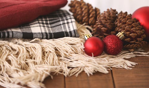 Free Two Red Baubles Beside Pine Cones Stock Photo