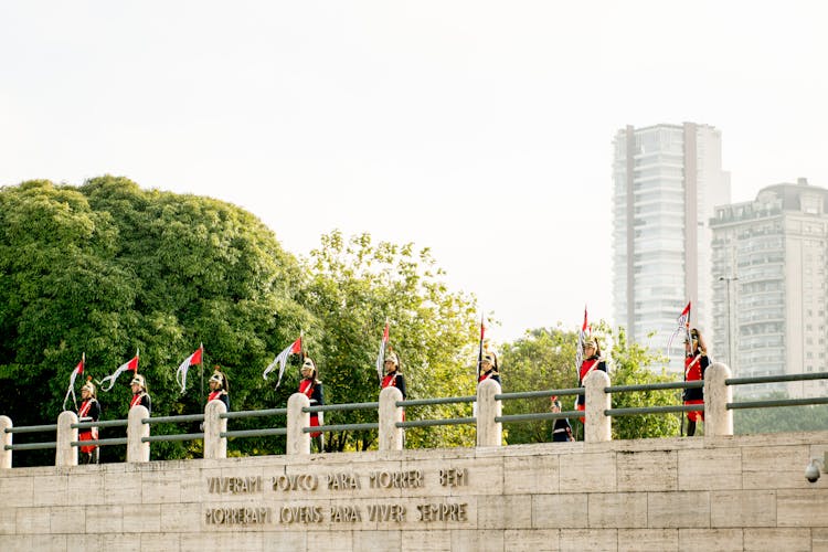 Guards In Uniforms At Monument