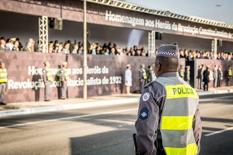 Police Officer On Street During Parade