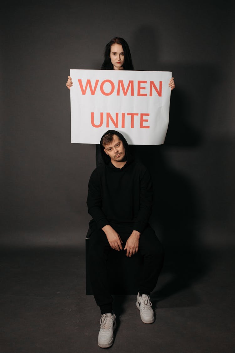 Woman Holding A Poster 