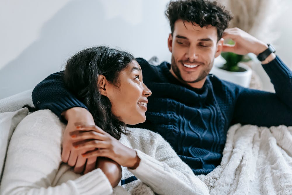 Couple relaxing together at home — fertility care in your own space