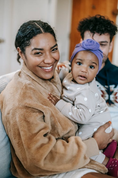 Free Smiling Mother and Baby Looking at Camera Stock Photo