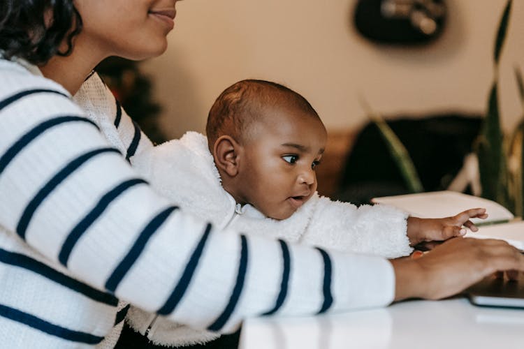 Crop Black Mother With Baby