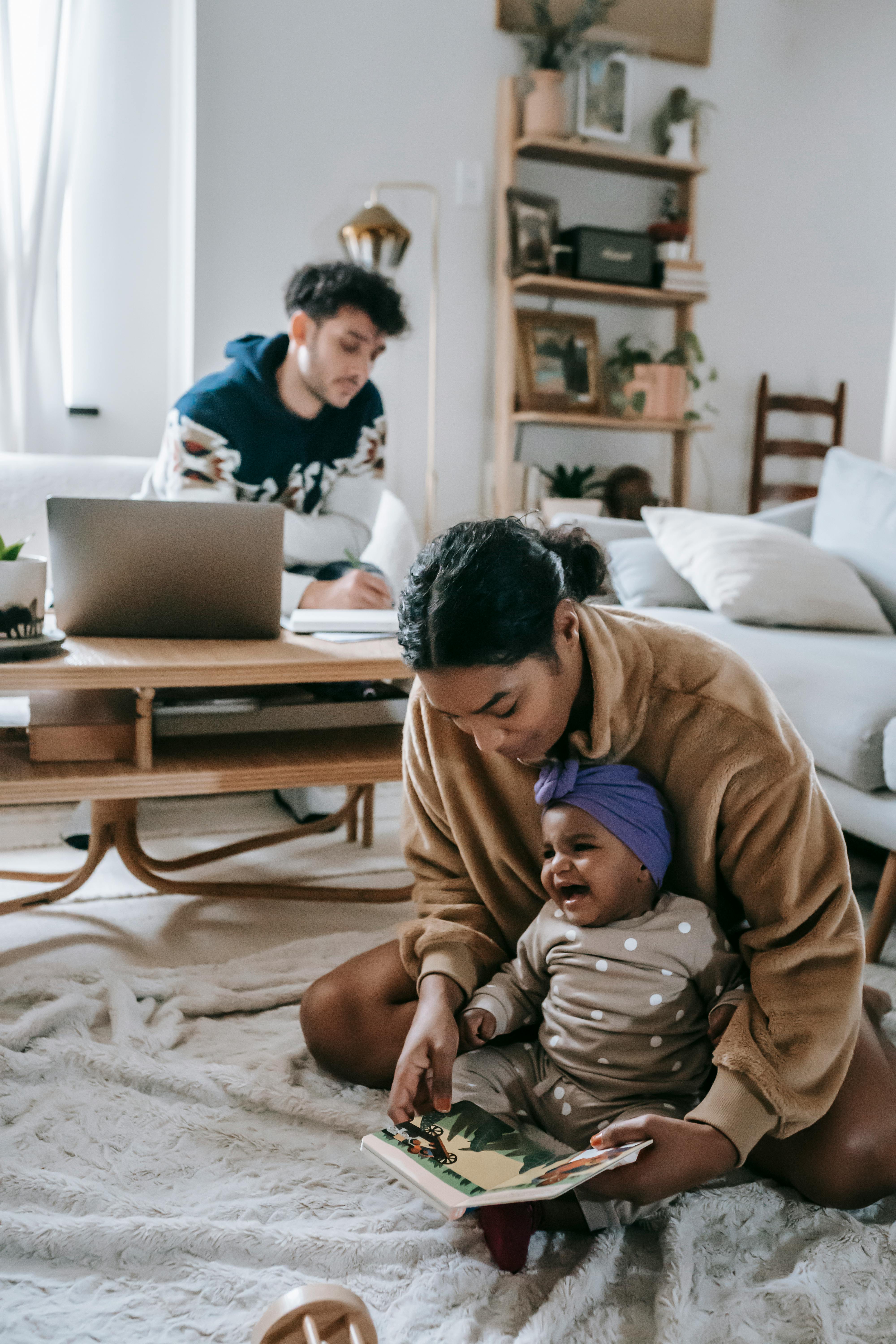 multiethnic family with black baby at home