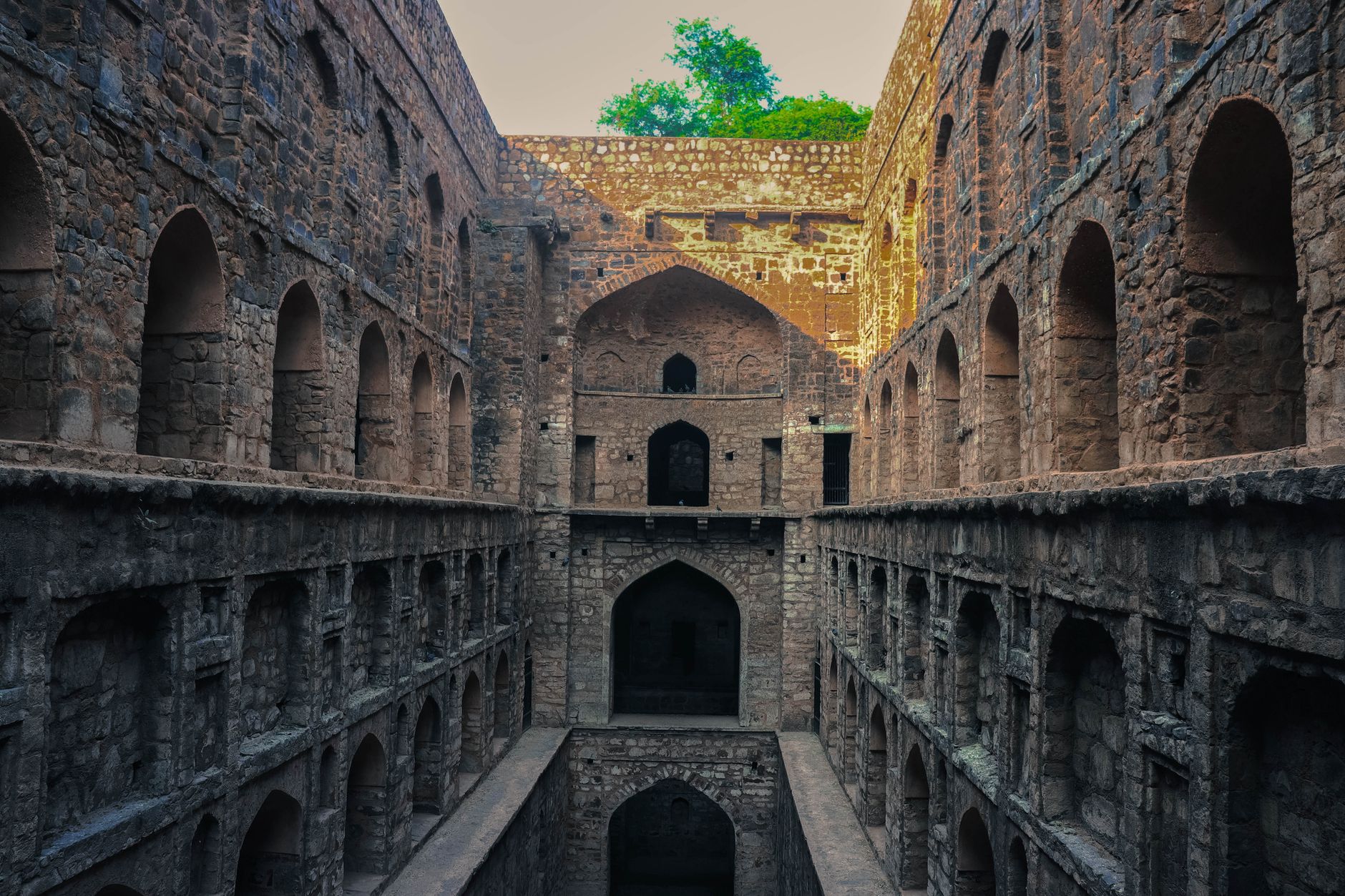 The stone arches and steps of Agrasen ki Baoli stepwell in Delhi