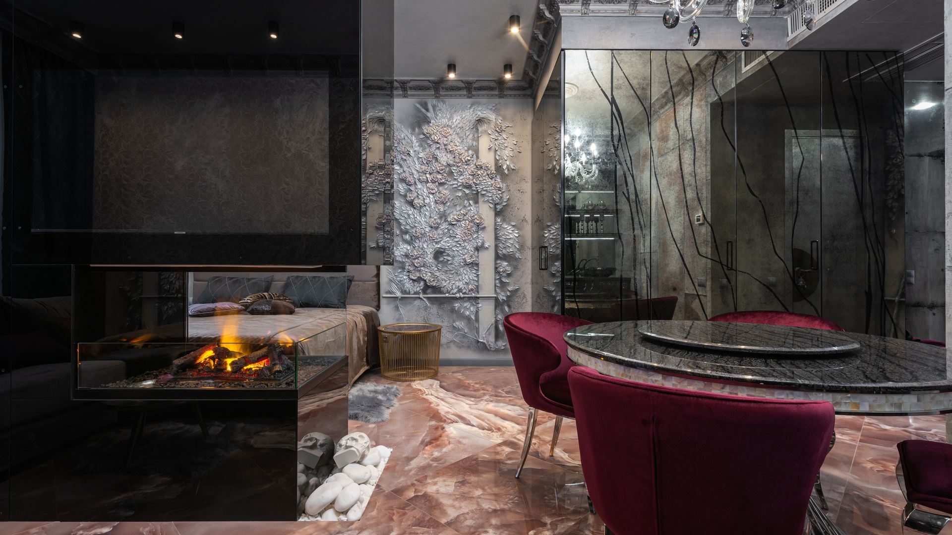 Vantaa Residence — dark stone living room with fireplace