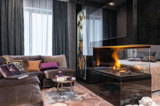 Elegant modern living room featuring a cozy fireplace and luxurious decor for ultimate relaxation.