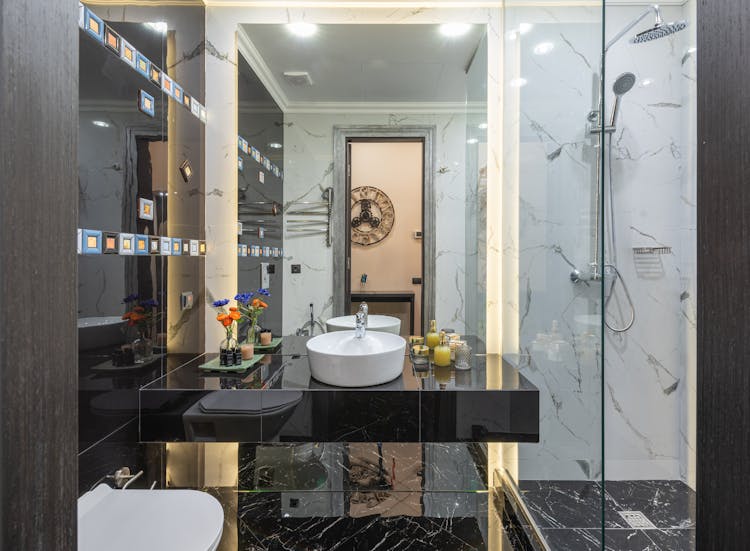 Modern Bathroom With Sink On Black Cupboard