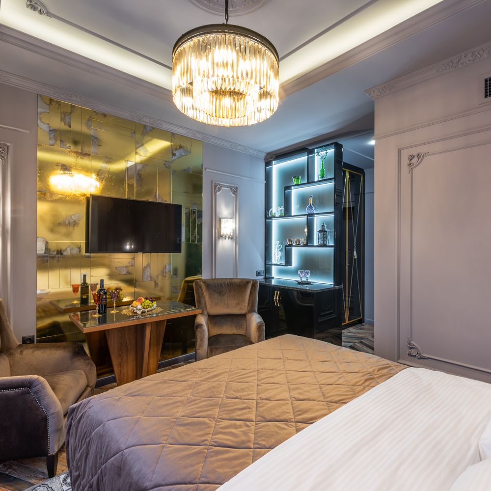 Wallpapering in Hayes — dust sheets down and the room fully protected