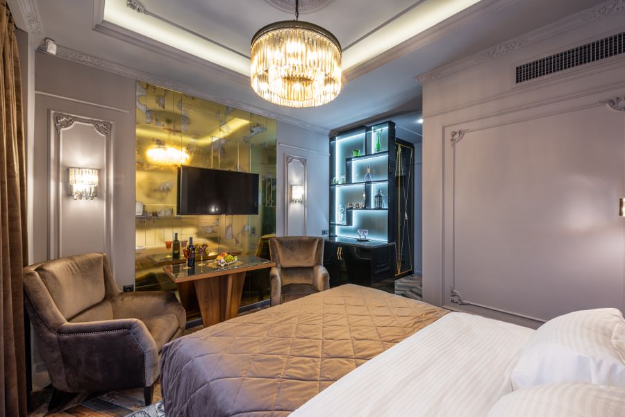 Video still of a styled hotel bedroom with soft lighting — photo by Max Vakhtbovych on Pexels