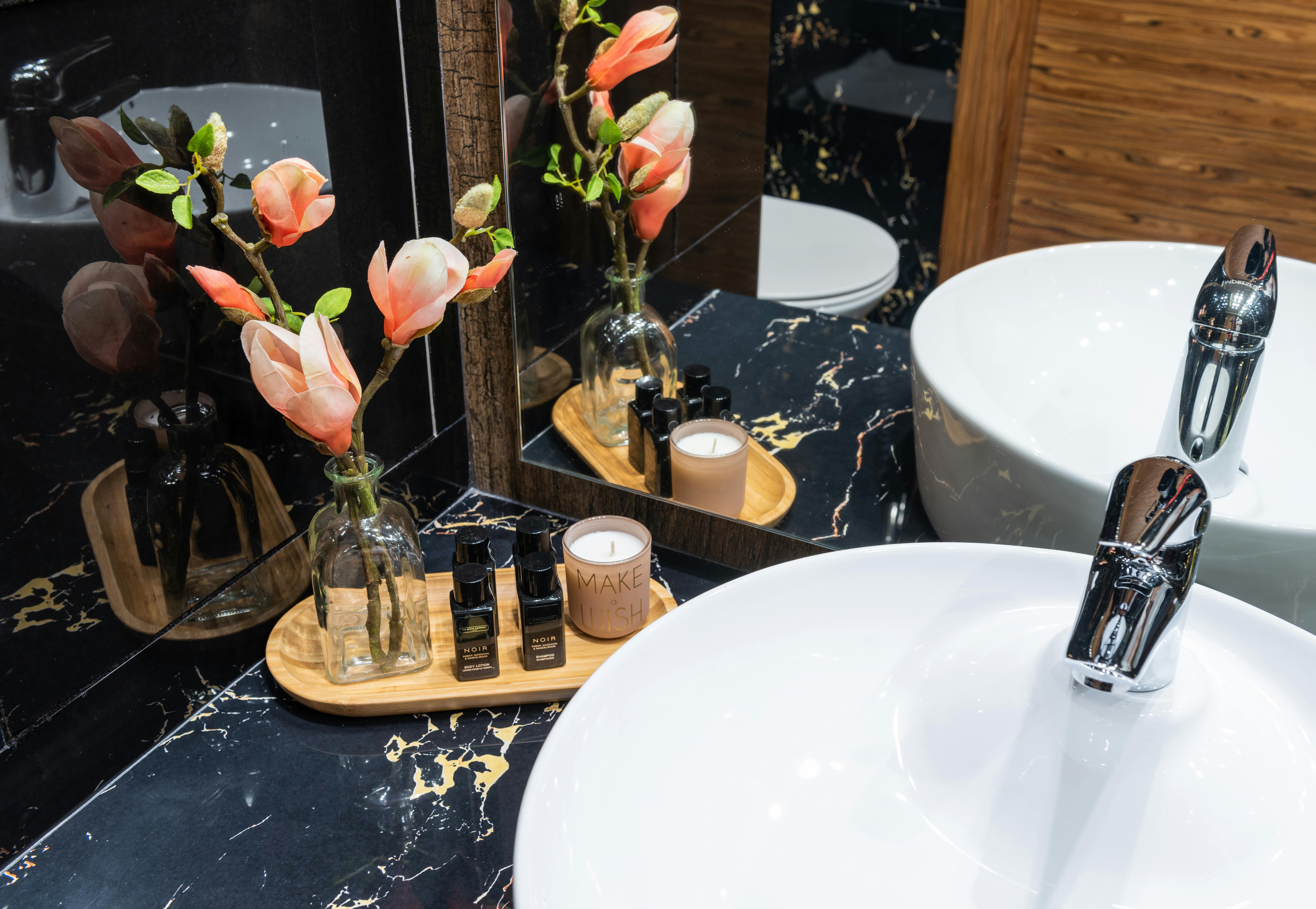 floral decor near washbasin in contemporary bathroom