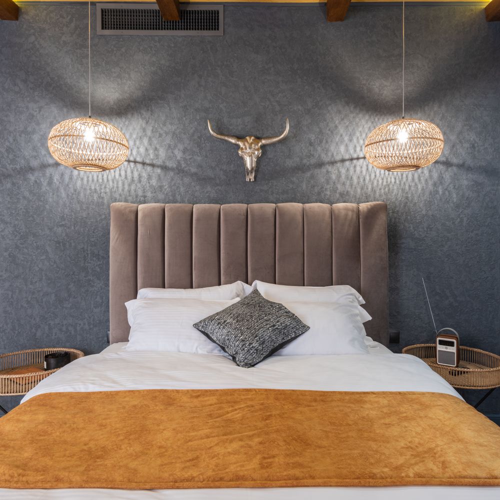 Wallpapering in Finsbury Park — woodwork brushed to a crisp, smooth line