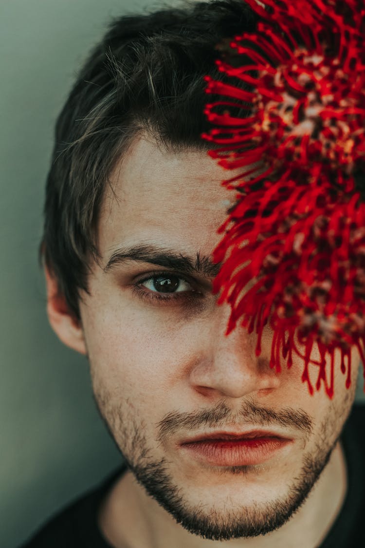 Serious Man Covered With Flower