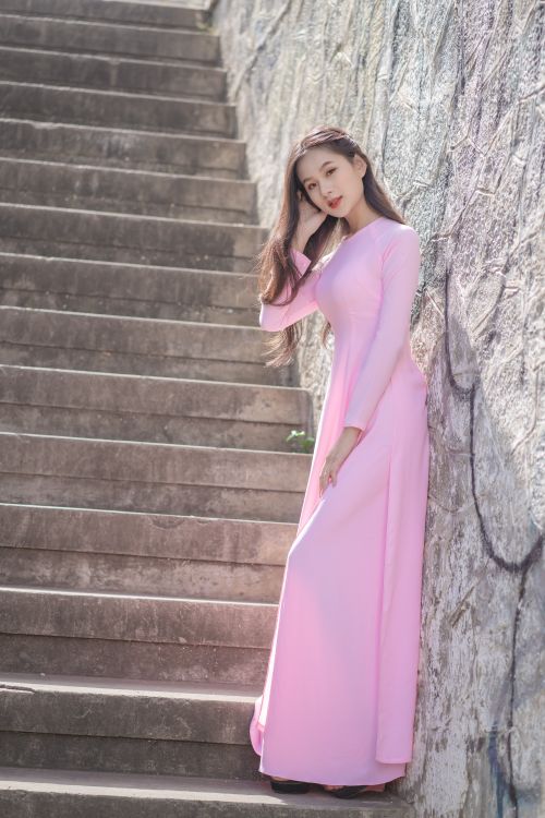 A Woman Wearing a Pink Dress · Free Stock Photo
