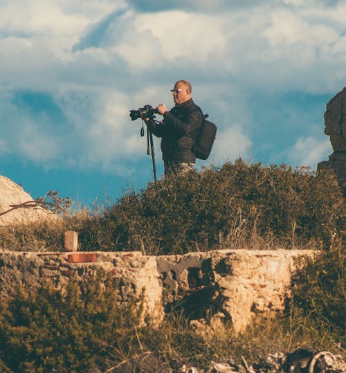 A Man Holding a Camera