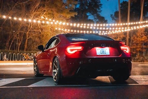 A Back View of a Red Car