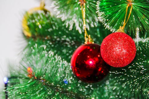 Close-up Photo of Hanging Christmas Balls on a Christmas Tree