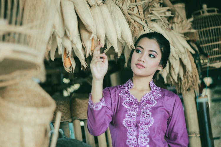 Woman In Embroidered Blouse